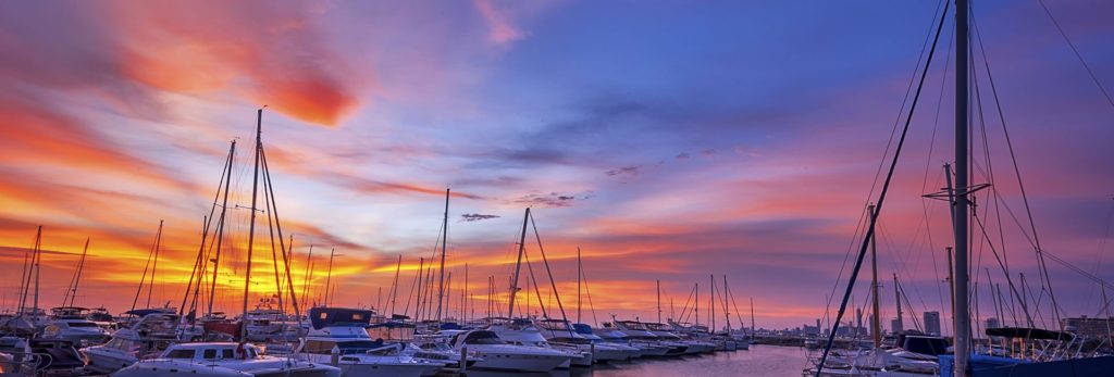 A yacht club captured at sunset