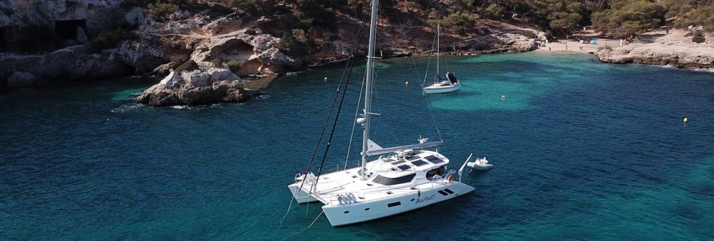 Catamaran docking in a marina