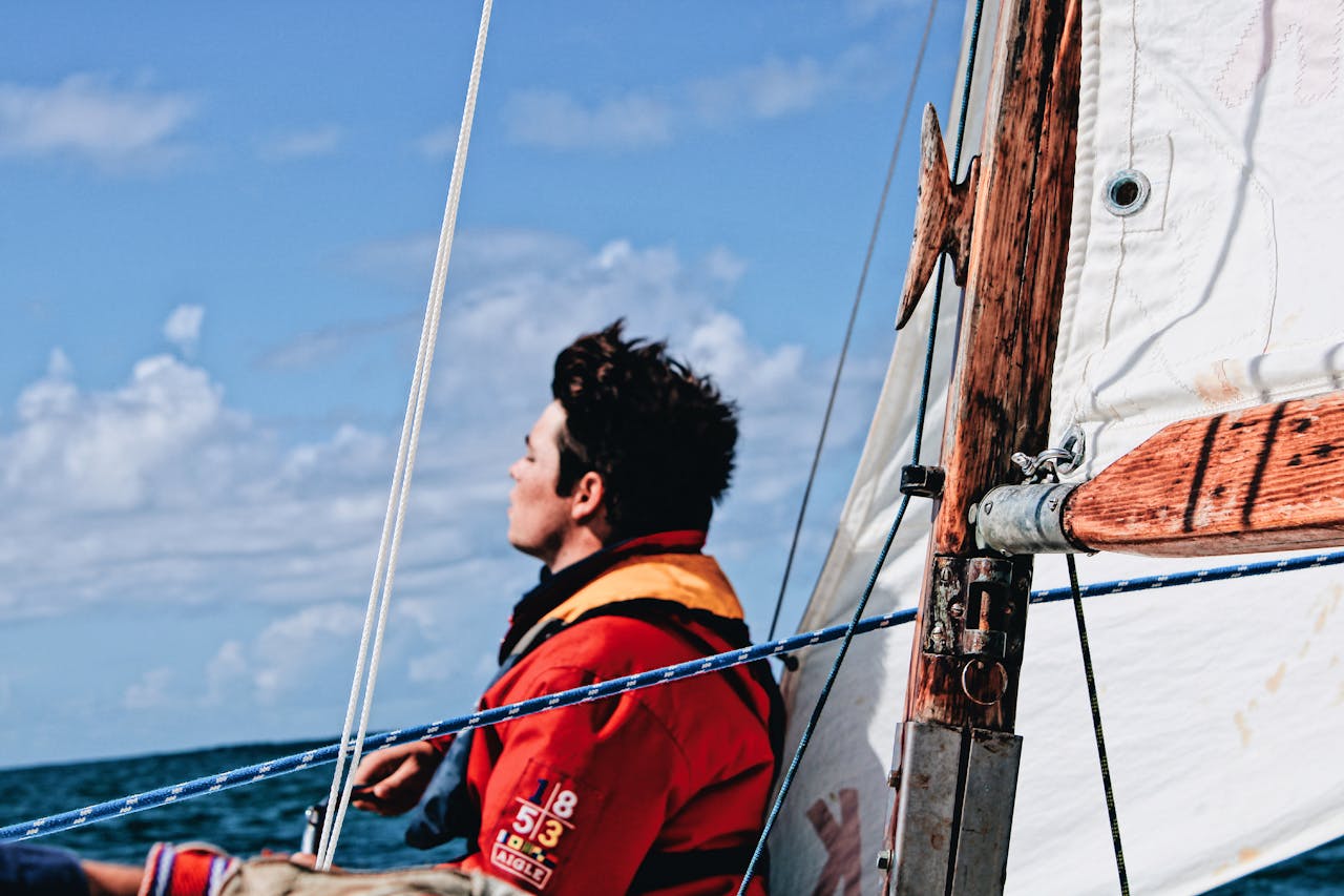 View Of A Sailor Onboard A Yacht